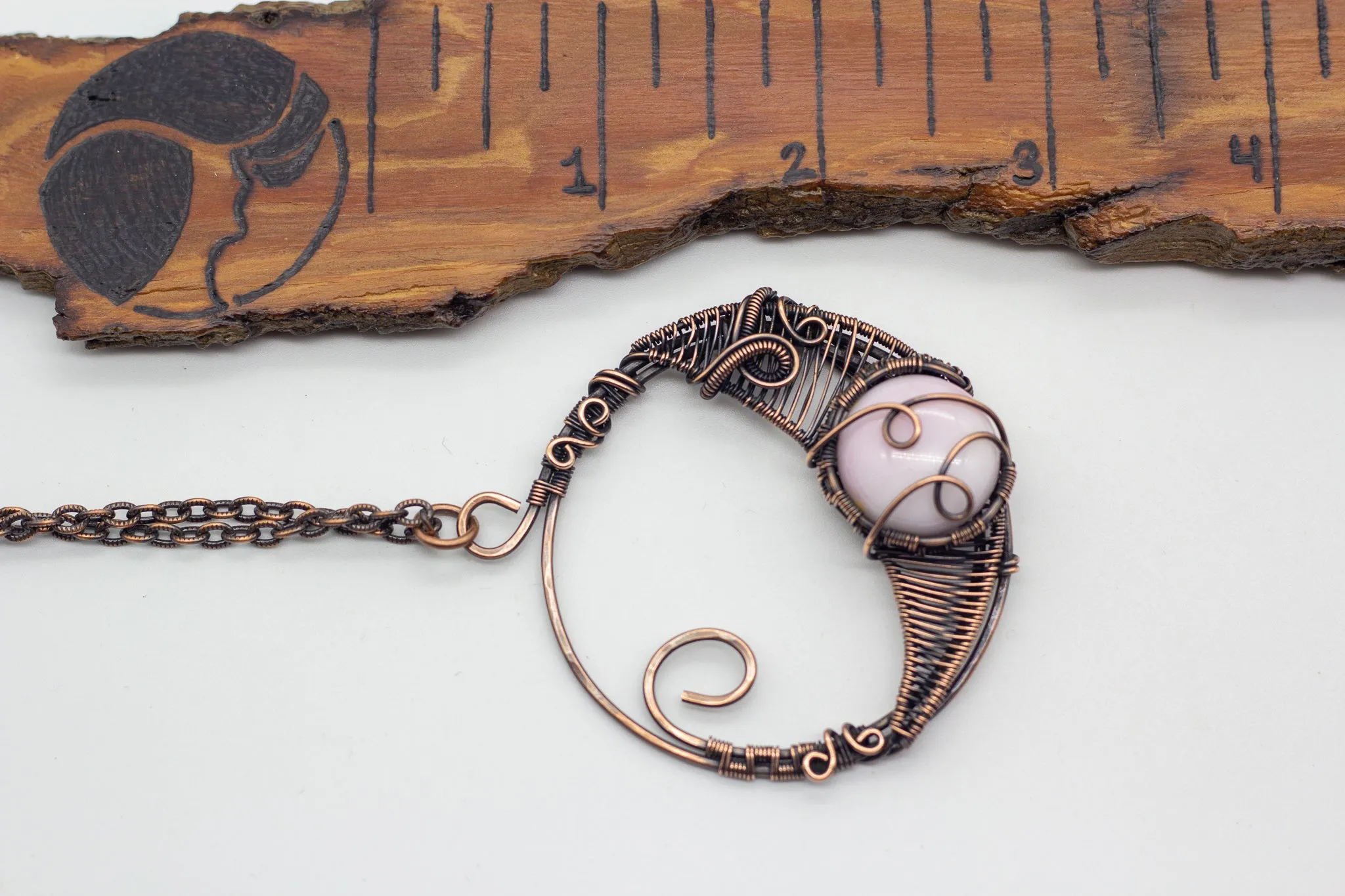 Circular Copper Wire Wrapped Pendant with Light Pink Fused Glass