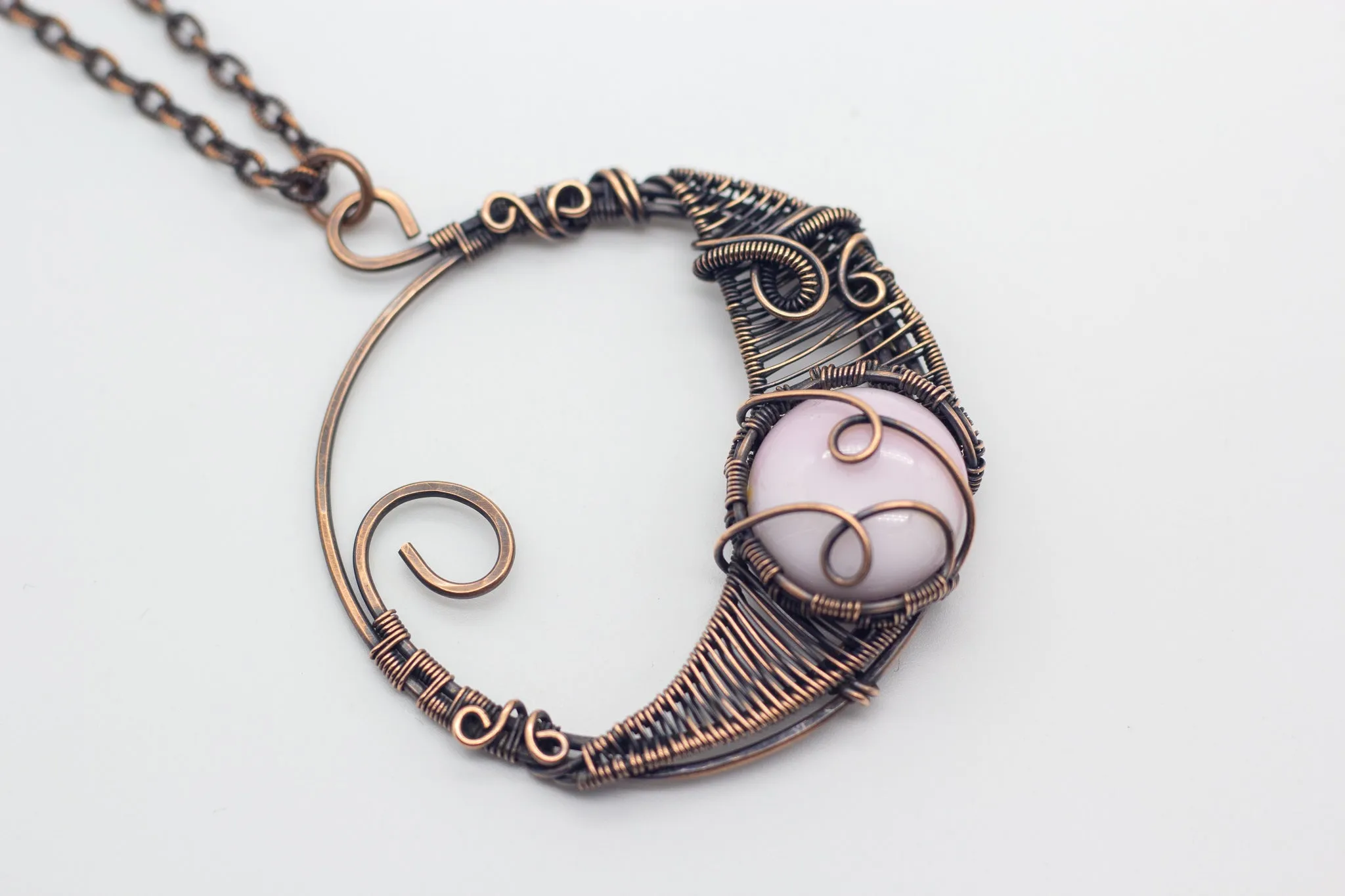 Circular Copper Wire Wrapped Pendant with Light Pink Fused Glass