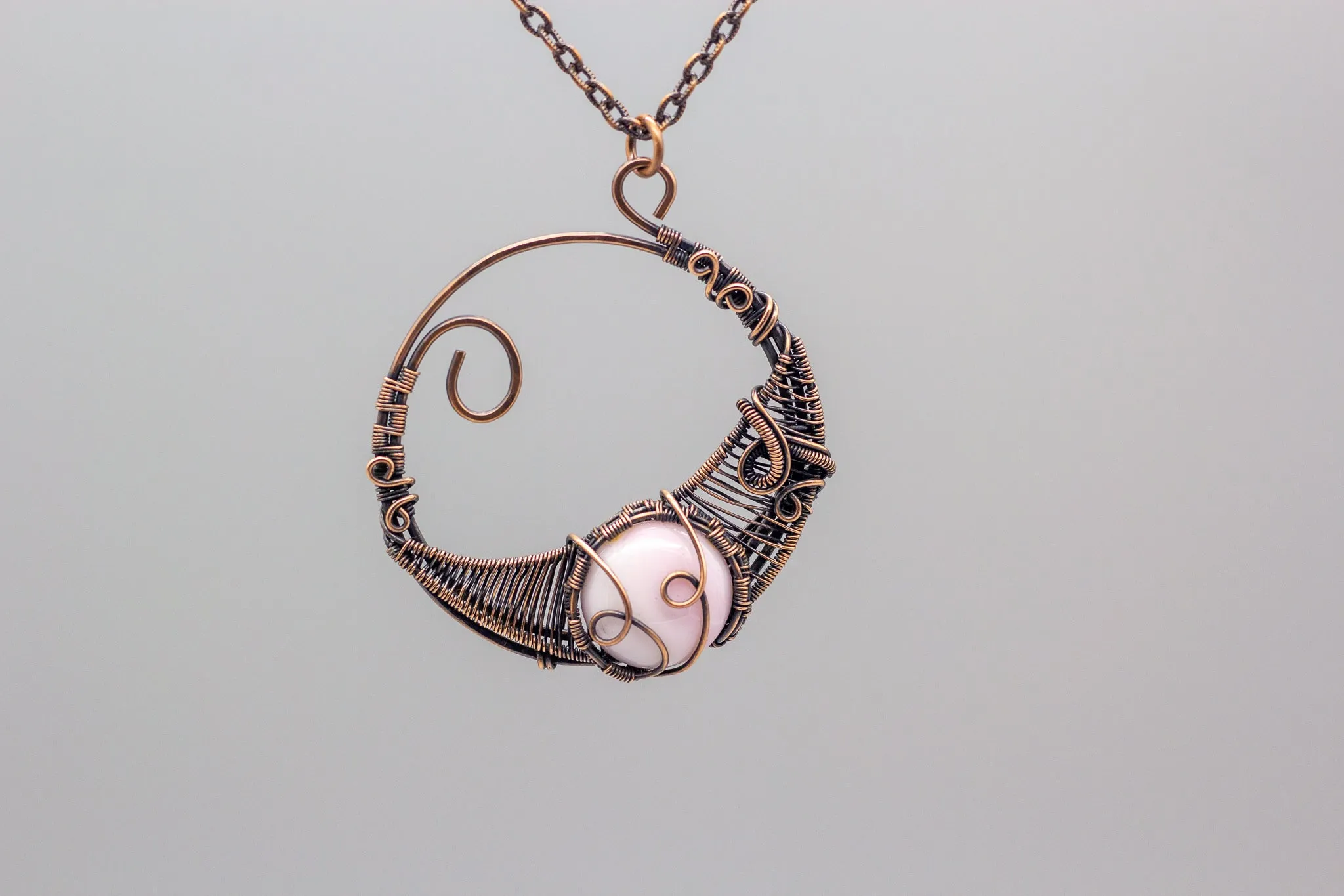 Circular Copper Wire Wrapped Pendant with Light Pink Fused Glass