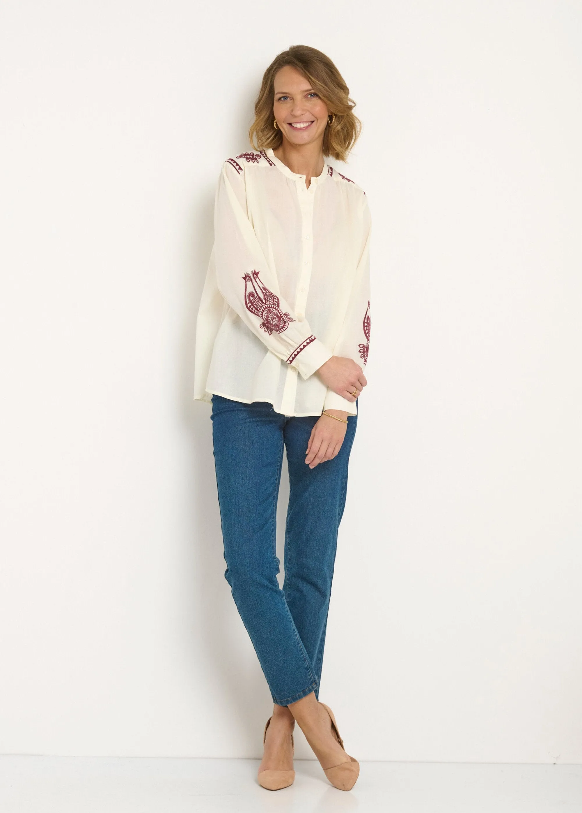 Loose blouse with contrasting embroidery