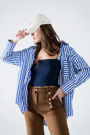 Poplin shirt with vertical stripes in blue and chest pocket
