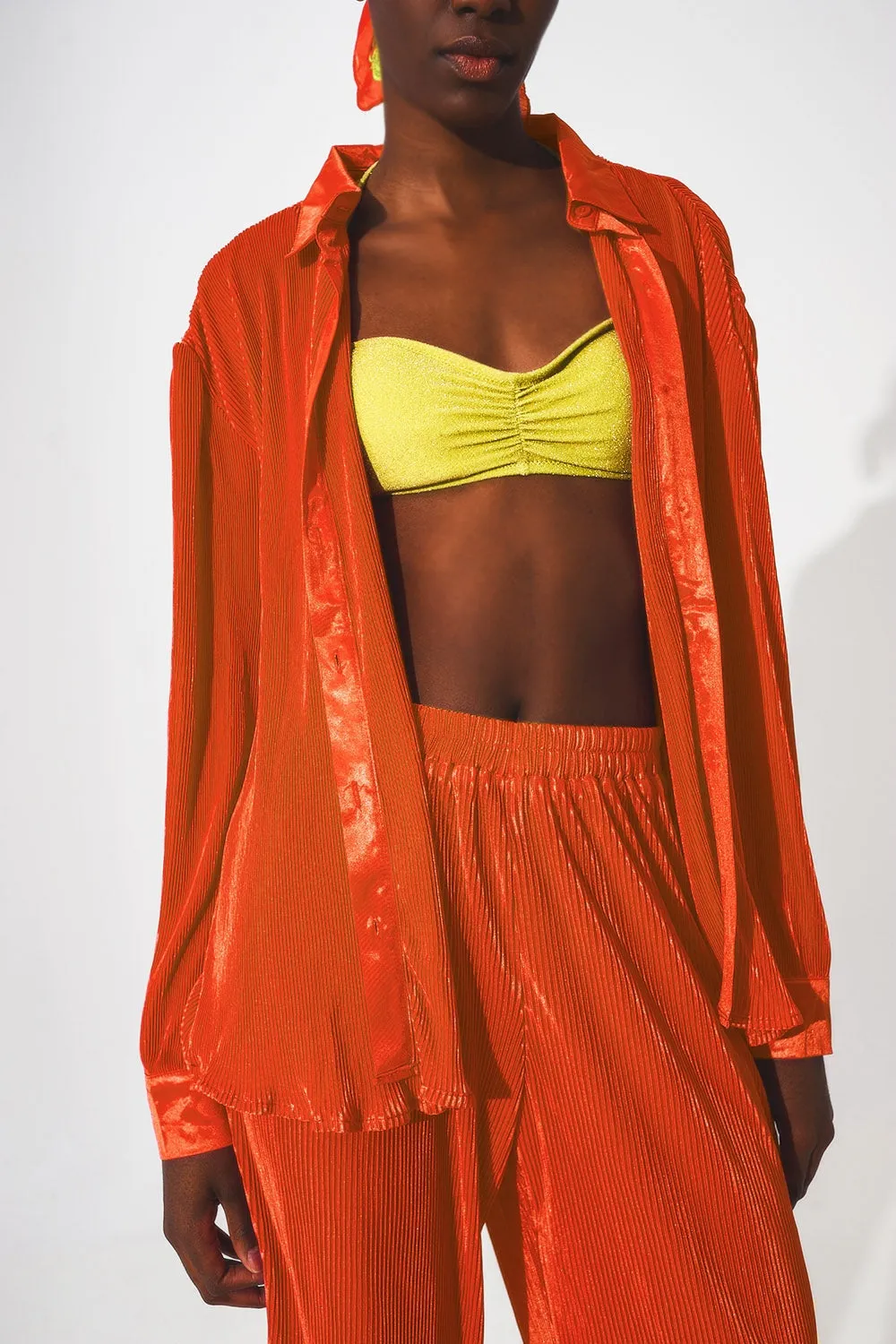 Relaxed pleated satin shirt in orange