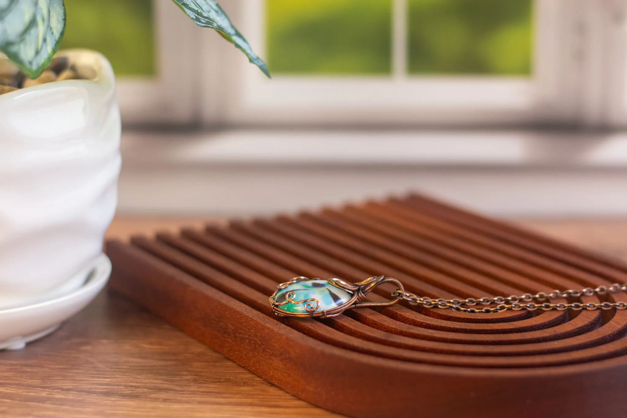 Streaked Green, Blue, and Black Fused Glass Pendant with Copper Wire Wrapping