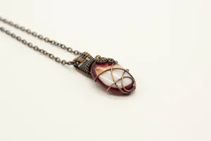 Streaked Red and White Oval Fused Glass Pendant with Copper Wire Wrapping